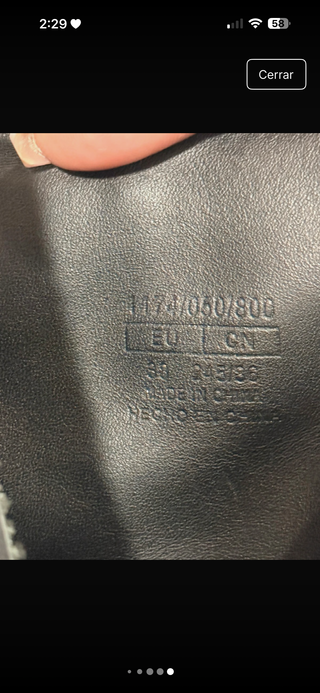 Botín cuero suela track con hebilla