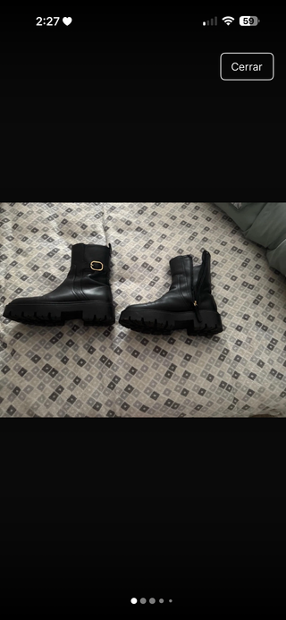 Botín cuero suela track con hebilla