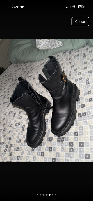 Botín cuero suela track con hebilla