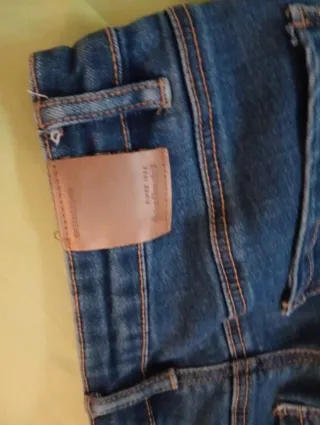 Pantalón tejano mujer flare deshilachado