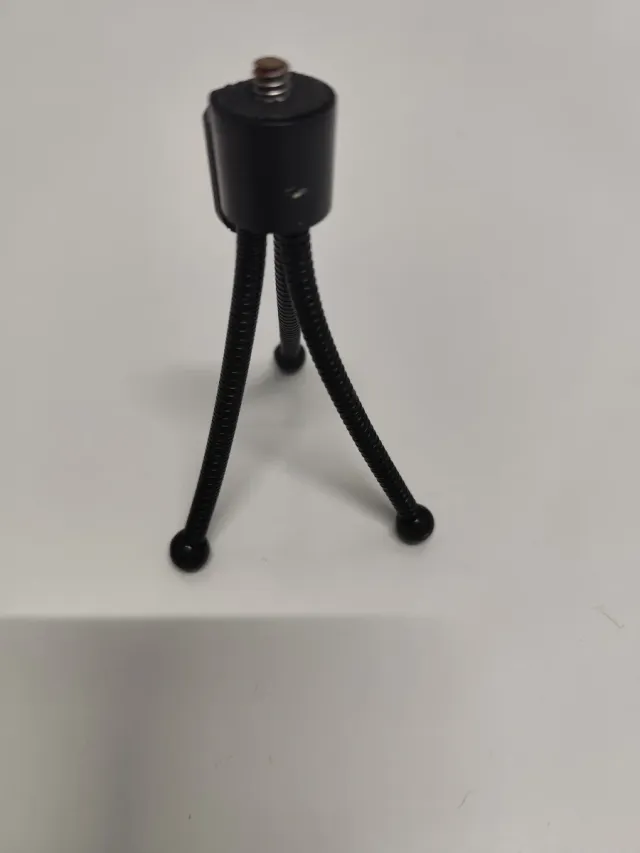 Mini tripé flexível para câmera