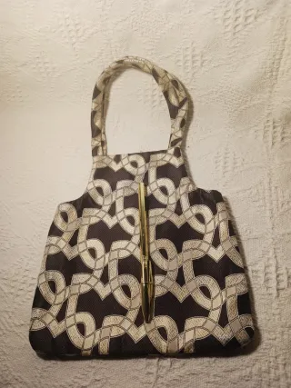 Bolso de fiesta negro y dorado