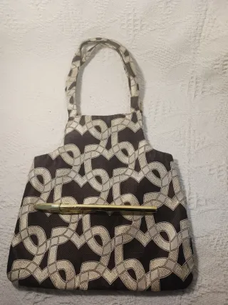 Bolso de fiesta negro y dorado