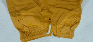 Pantaloncini neonato giallo con laccetto