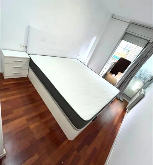 Canapé a ribalta in polipelle bianca