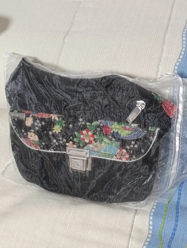 Riñonera Caomka Negra Estampada