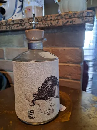 Bottiglia vuota Manara J.Rose firmata