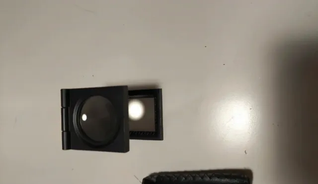 Lupa 10x con funda y paño