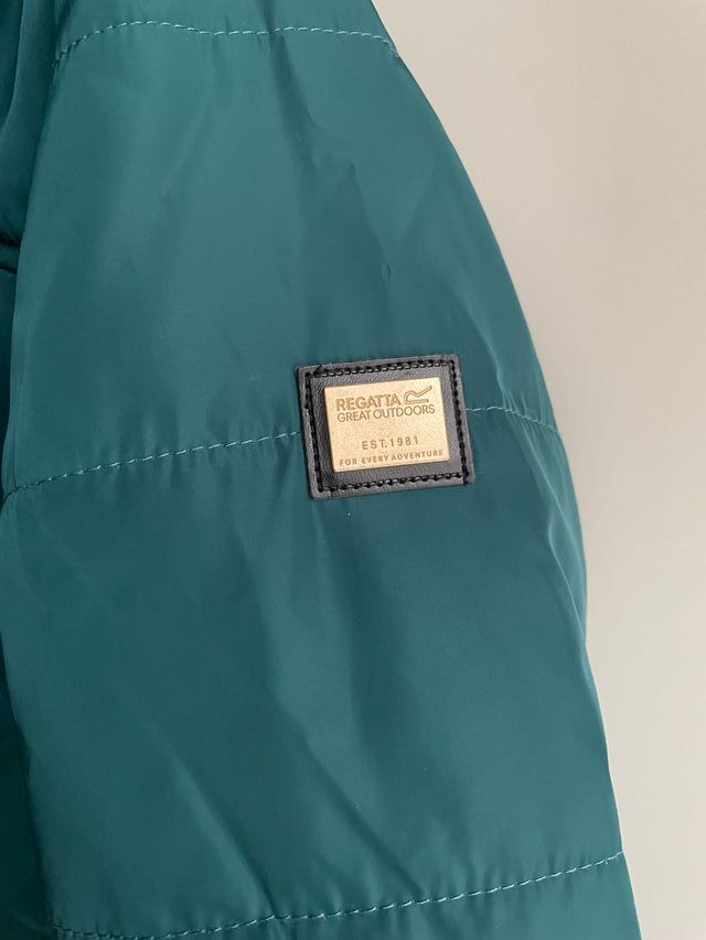 Giacca verde trapuntata con cappuccio