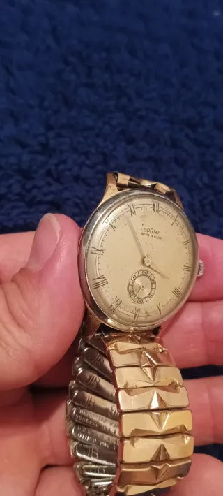 Reloj Dogma Dorado y Plateado