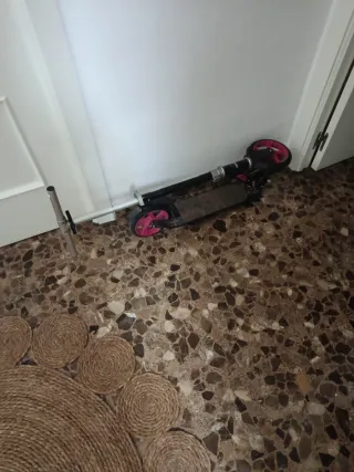 Patinete Oxelo rosa y negro