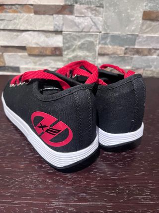 Zapatillas con ruedas niño negras