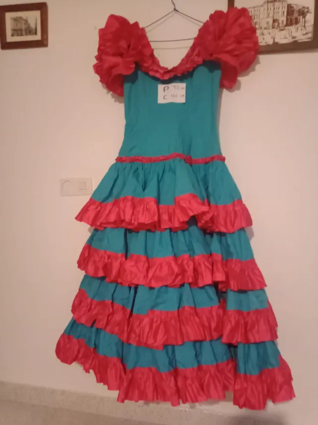 Traje de flamenca volantes rosa y turquesa