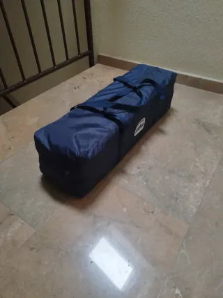 Cuna de viaje azul y gris