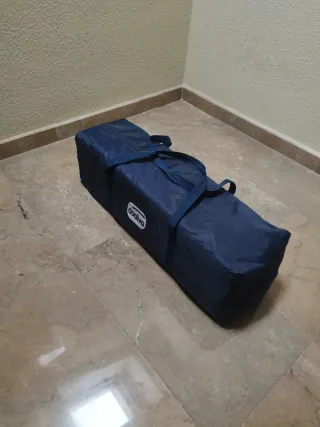 Cuna de viaje azul y gris