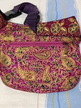 Riñonera Caomka y monedero multicolor