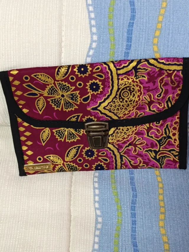 Riñonera Caomka y monedero multicolor