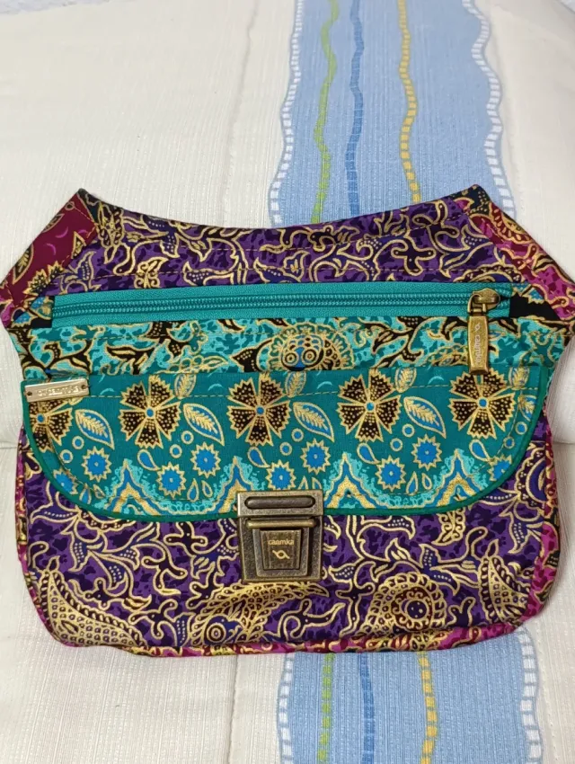 Riñonera Caomka monedero morado y turquesa