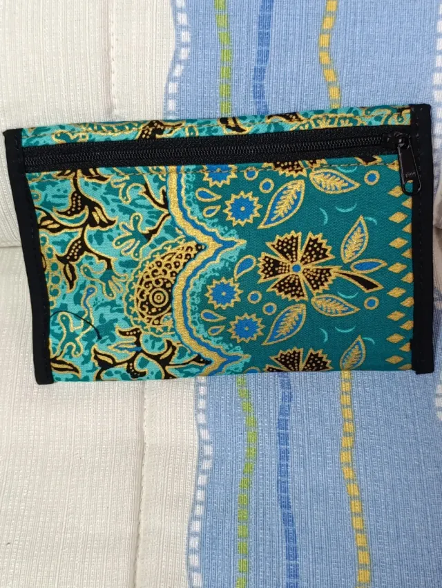 Riñonera Caomka monedero morado y turquesa