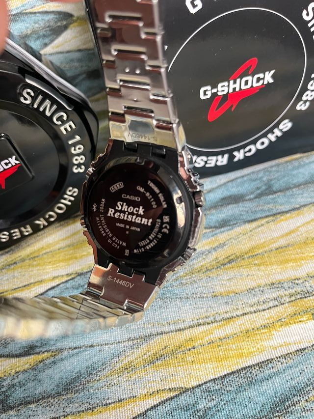 Casio G-Shock Metálico Esfera Turquesa