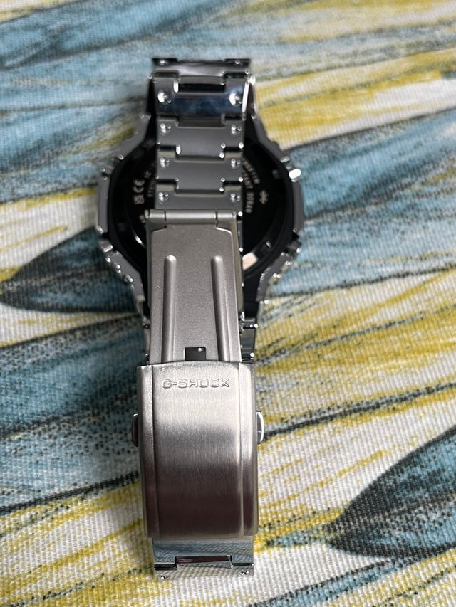 Casio G-Shock Metálico Esfera Turquesa