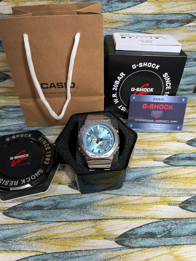 Casio G-Shock Metálico Esfera Turquesa