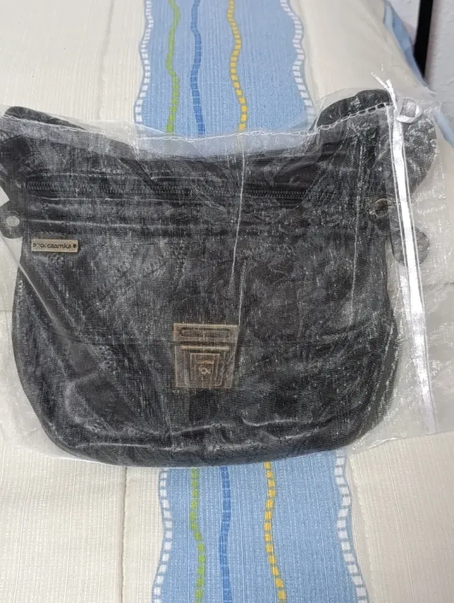 Riñonera de piel Caomka negra