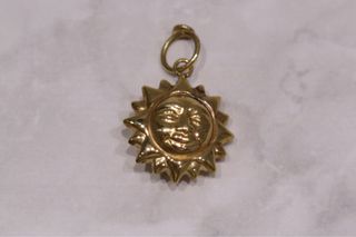 COLGANTE SOL, ORO 18K/3.0g