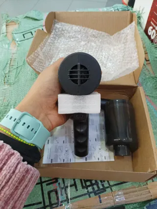 Aspirador de mano portátil