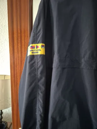 Cortaviento In Extenso azul y amarilla