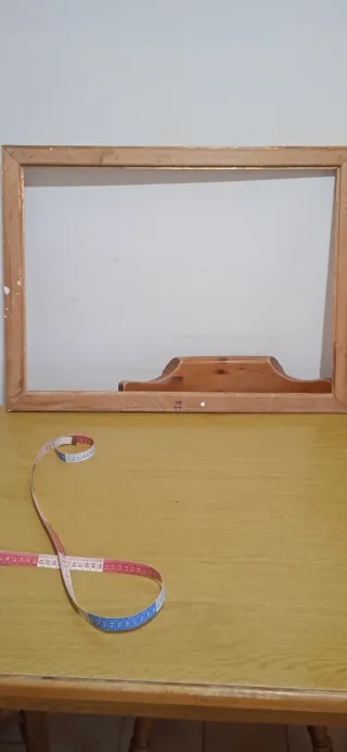 Cornice in legno con supporto