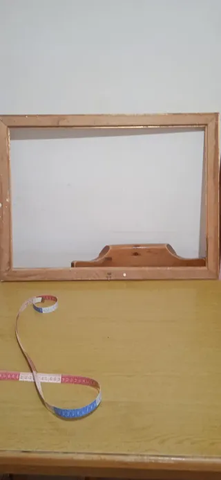 Cornice in legno con supporto