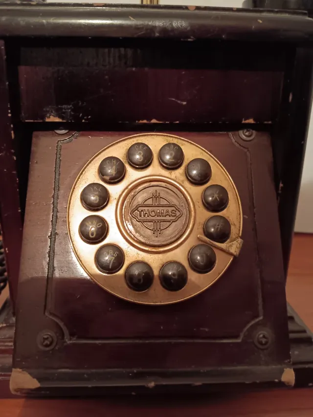 Teléfono antiguo Thomas madera y latón