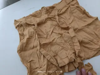 Shorts de tela con cinturón