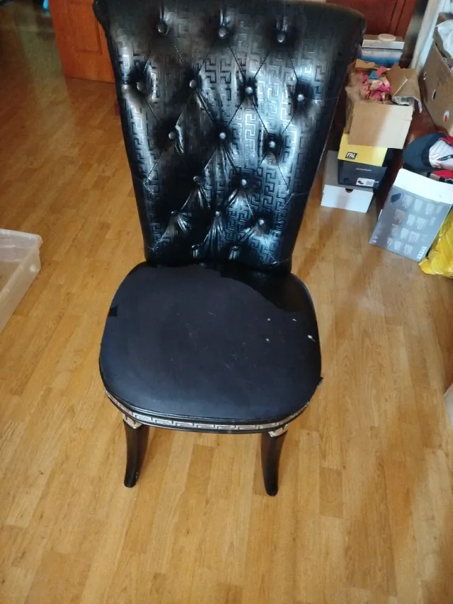 Sillón negro capitoné