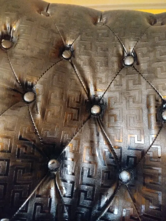 Sillón negro capitoné