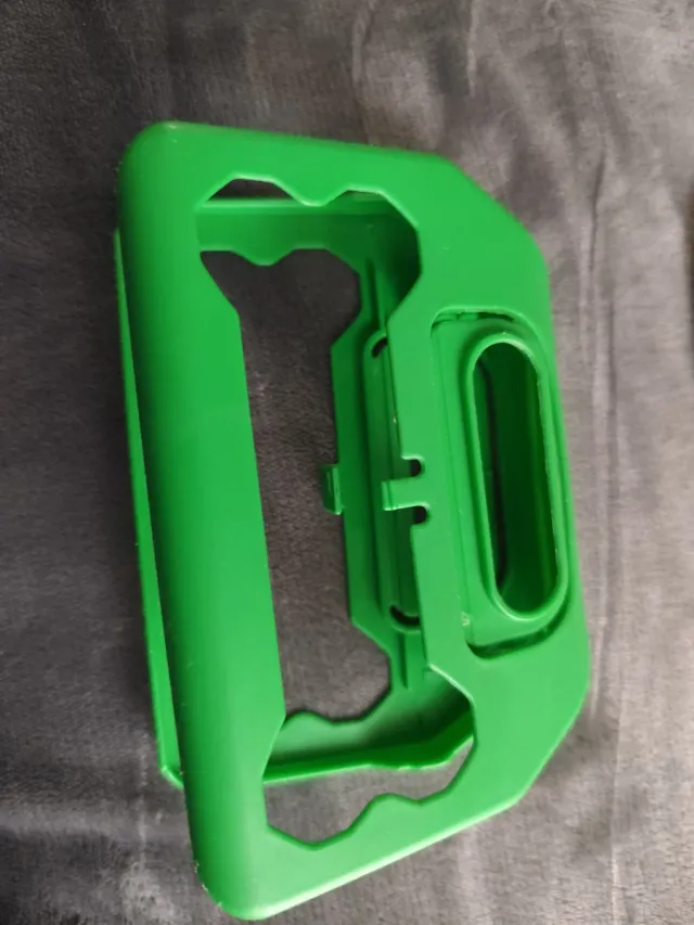 Pinza raccogli escrementi cane