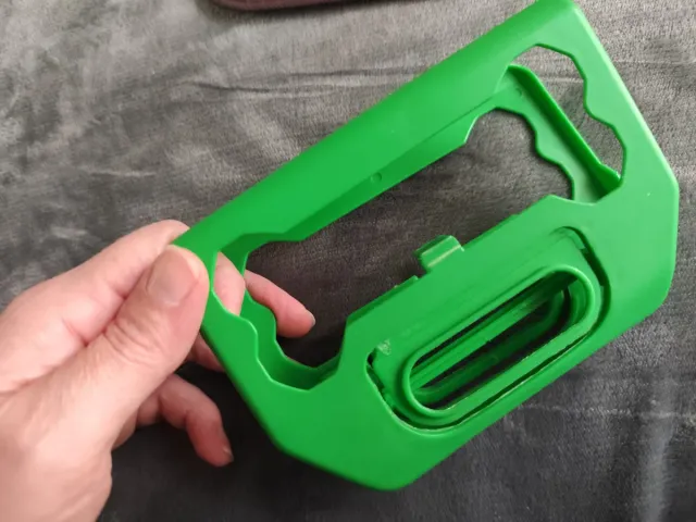 Pinza raccogli escrementi cane