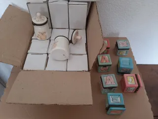 24 bomboniere a forma di biberon e di dado