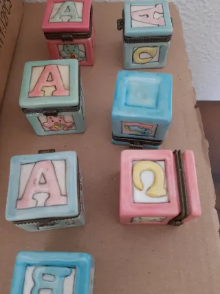 24 bomboniere a forma di biberon e di dado