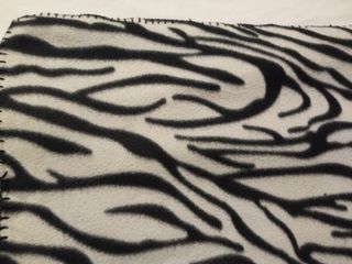 Manta fina estampado cebra sofá