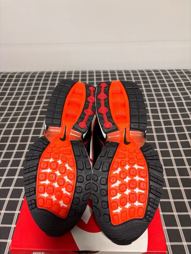 Nike Air Max DN Naranja y Negro