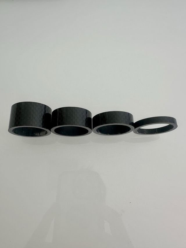 Separadores carbono dirección ciclismo