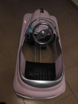 Coche infantil de metal rosa