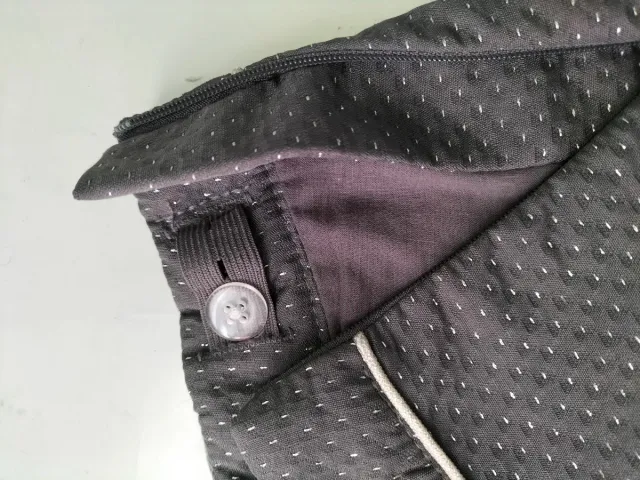 Falda gris niña con puntos blancos