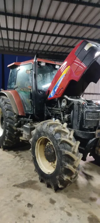 New Holland TM155 + Desbrozadora Cancela