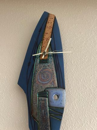 Reloj de pared con péndulo