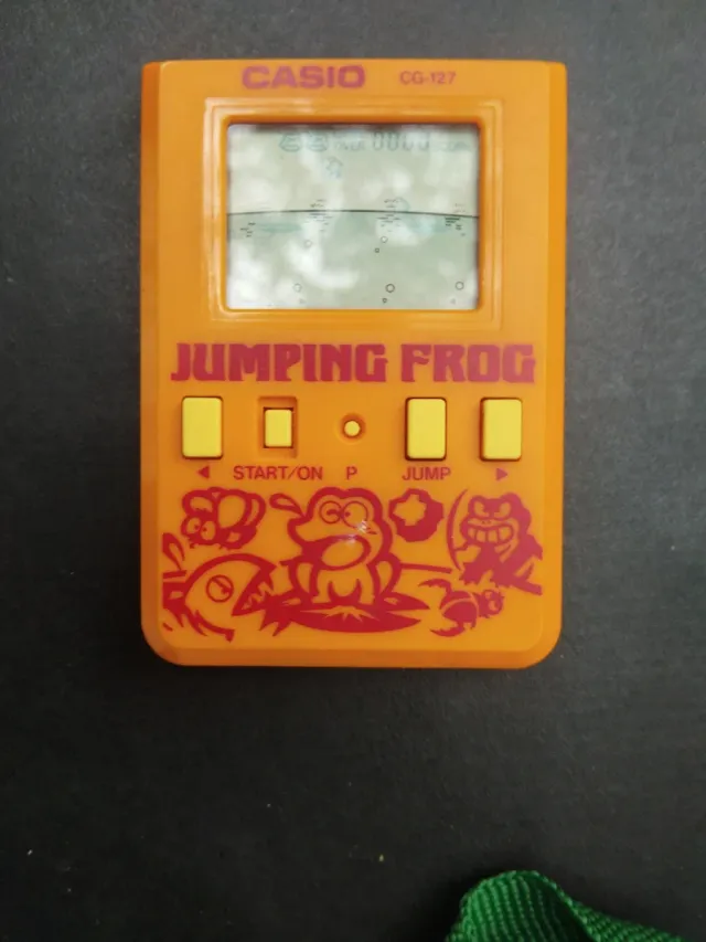 Consola Casio CG-127 Jumping Frog Naranja