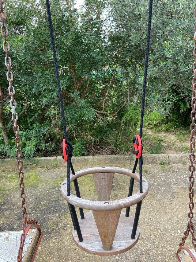 Dondolino in legno per bambini