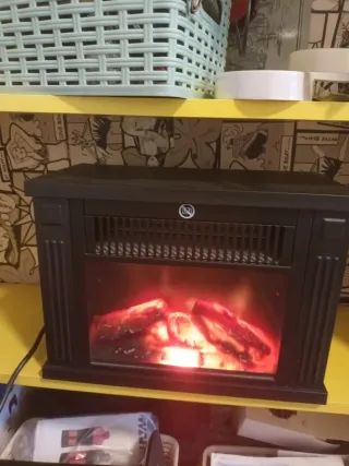 Estufa chimenea negra con cristal